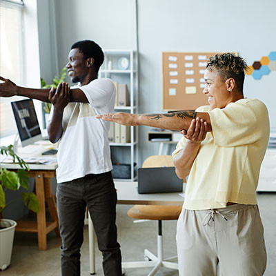 How to Stretch at Your Desk to Keep Yourself Limber